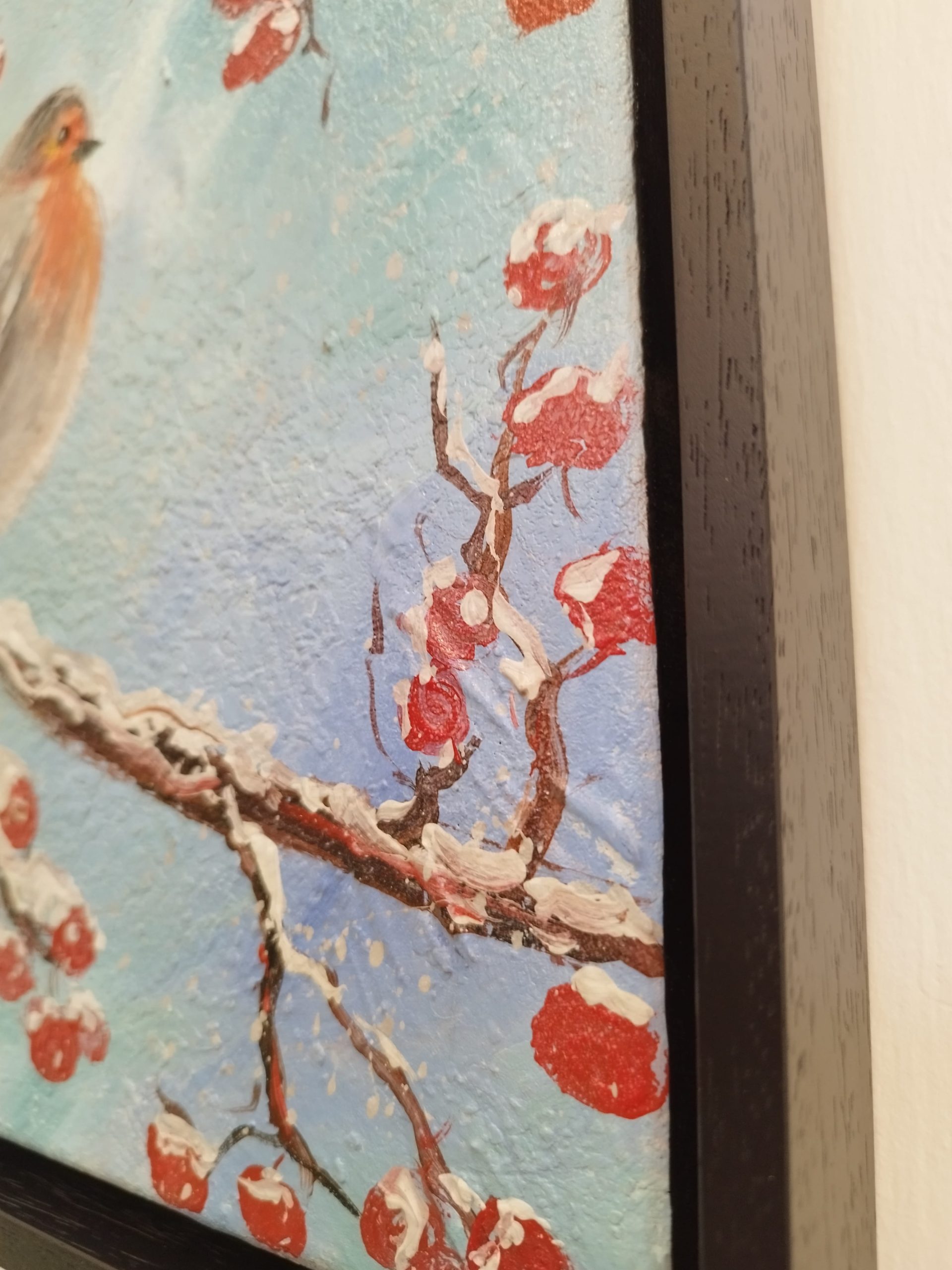 Robin on a snowy branch - Image 3